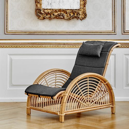 Lounge chair handcrafted from Natural Cane Rattan. Available at Trinity Crafts