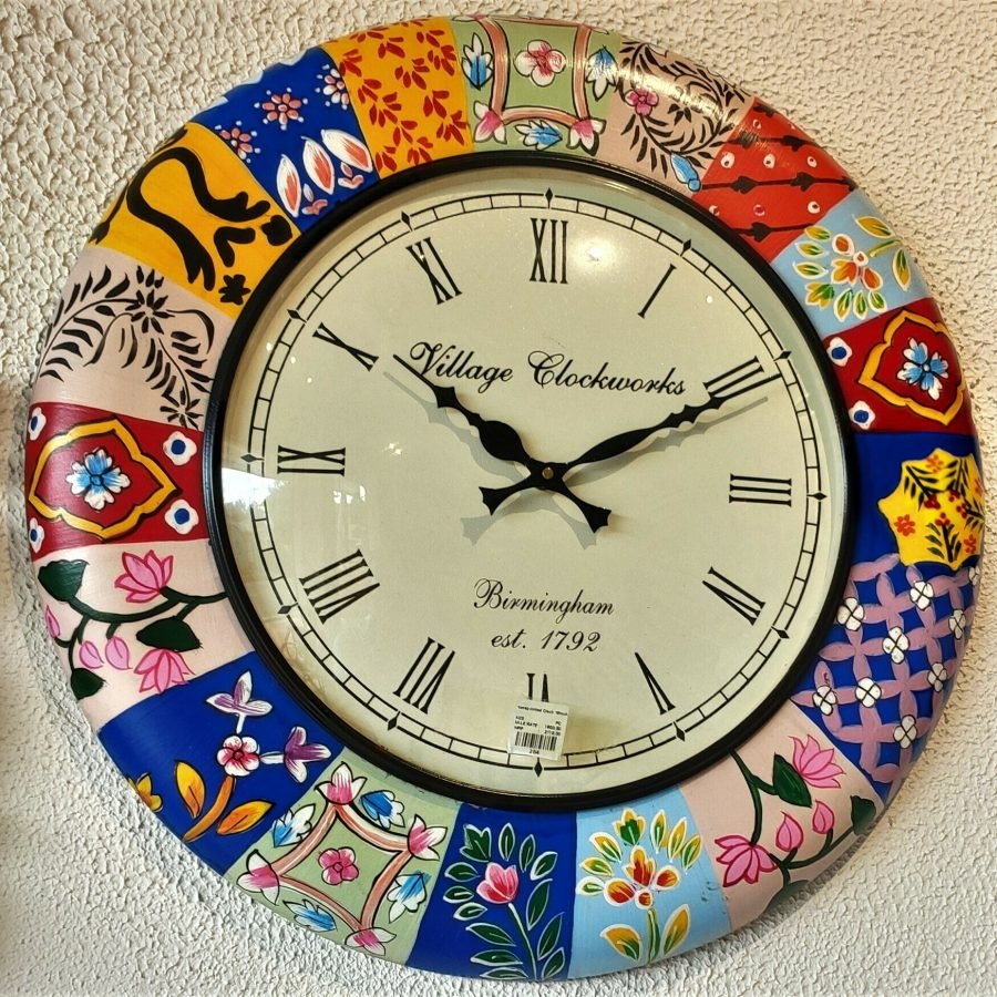 Handpainted wall clock at Trinity Crafts, Kangra